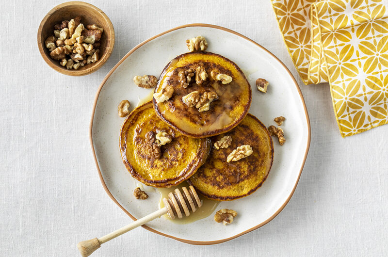 Healthy spiced pumpkin oatmeal pancakes with ginger honey.