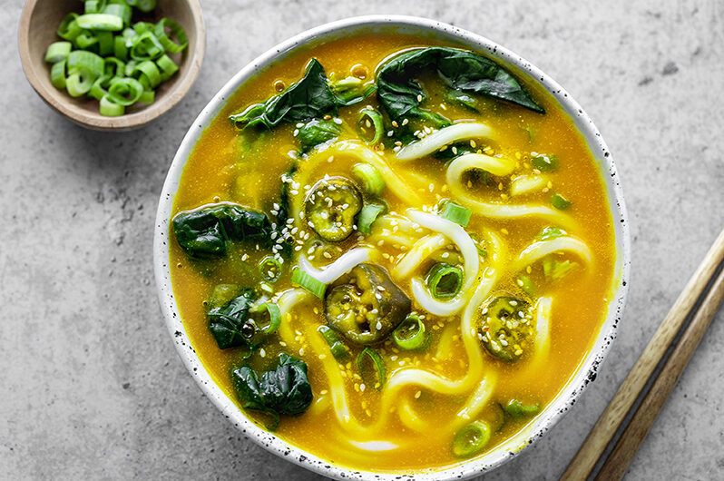 Soup of the day: Udon noodle soup with pumpkin miso broth and vegetables. Vegan recipe.